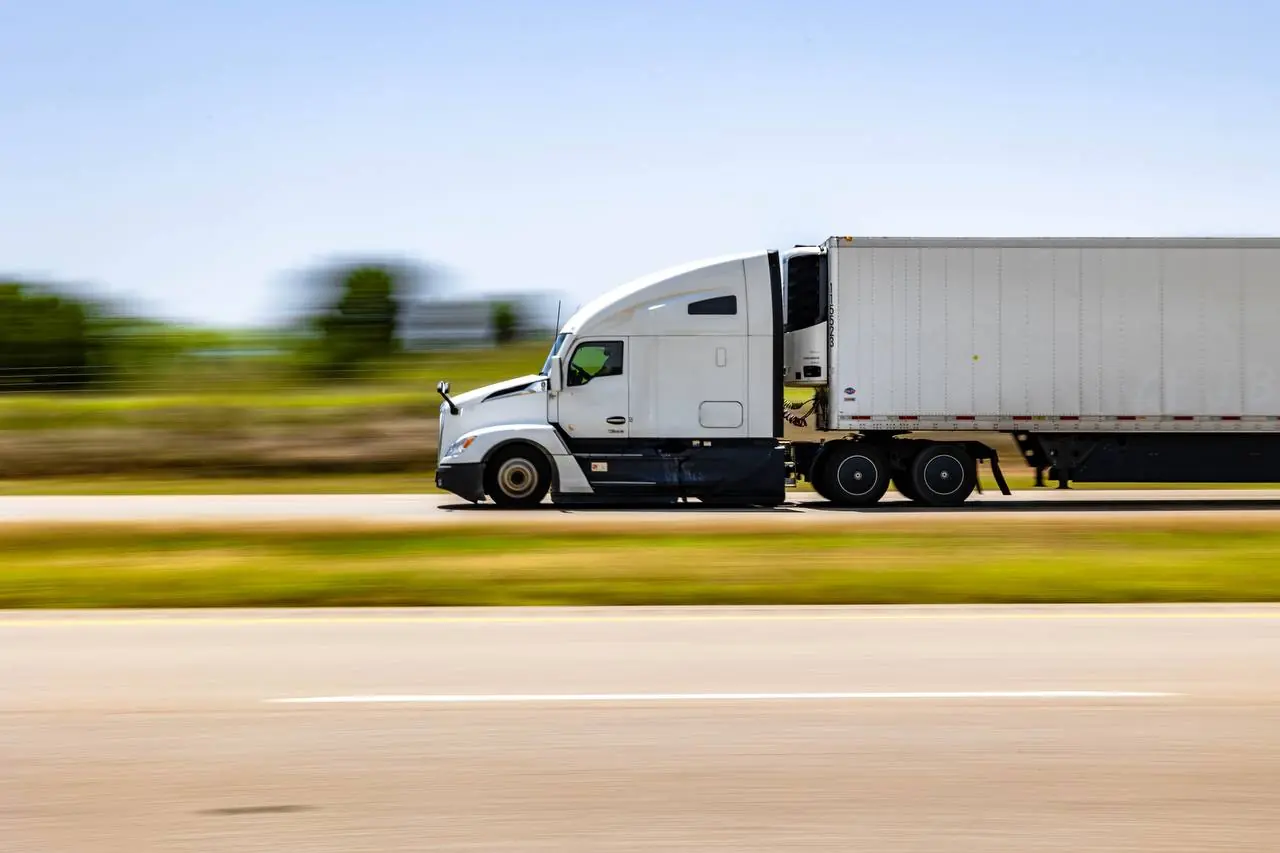 Professional moving truck on highway